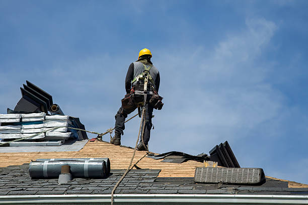 Professional Storm Damage Roof Repair technician working in Cortlandt Manor, NY